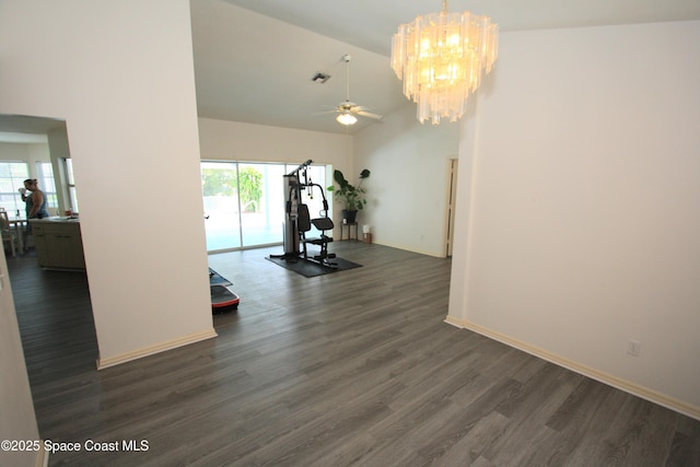 1366 17th Pl SW, Vero Beach, FL 32962 - exercise room featuring dark wood finished floors, a chandelier, and ceiling fan