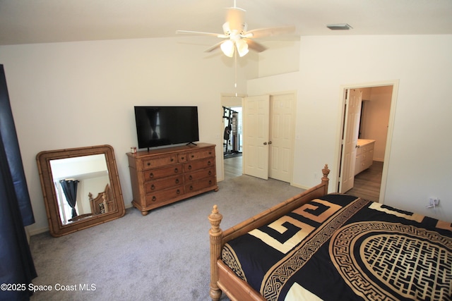 1366 17th Pl SW, Vero Beach, FL 32962 - bedroom with carpet, lofted ceiling, connected bathroom, and ceiling fan