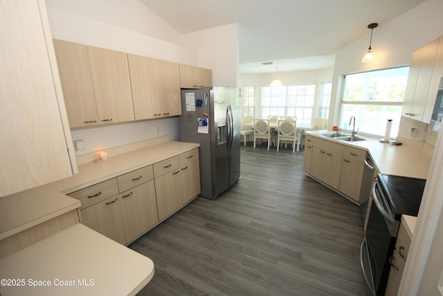 1366 17th Pl SW, Vero Beach, FL 32962 - kitchen featuring black / electric stove, stainless steel refrigerator with ice dispenser, light brown cabinetry, dark wood-style flooring, and decorative light fixtures