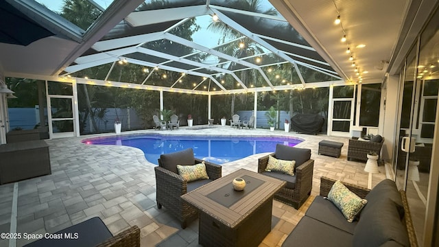 210 Pelican Dr, Melbourne Beach, FL 32951 - view of pool with an outdoor hangout area, a patio area, and glass enclosure