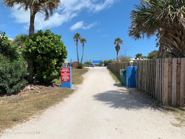 210 Pelican Dr, Melbourne Beach, FL 32951 - view of dirt / gravel road
