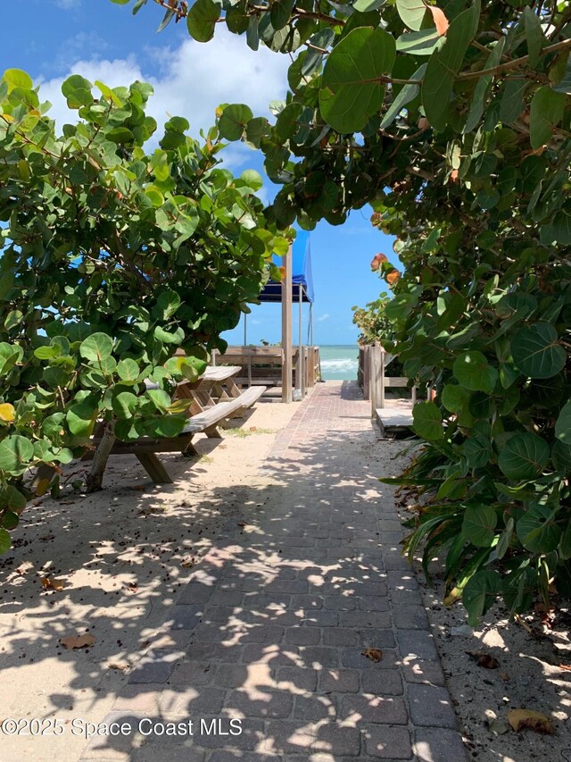210 Pelican Dr, Melbourne Beach, FL 32951 - view of yard with view of water and beach