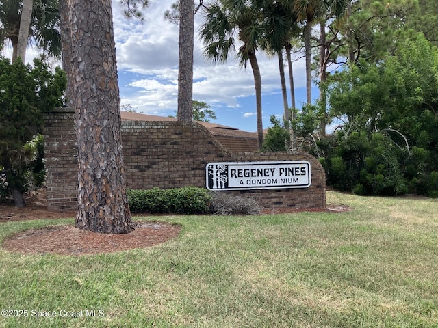 1515 Huntington Ln Unit 223, Rockledge, FL 32955 - community sign with a lawn
