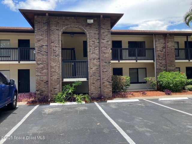 1515 Huntington Ln Unit 223, Rockledge, FL 32955 - view of property with uncovered parking