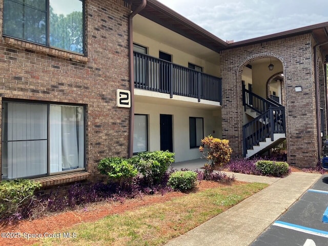 1515 Huntington Ln Unit 223, Rockledge, FL 32955 - view of property with stairway