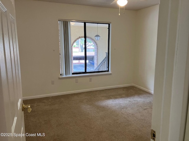 1515 Huntington Ln Unit 223, Rockledge, FL 32955 - unfurnished room with carpet and ceiling fan