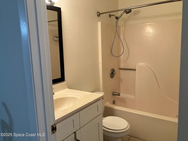 1515 Huntington Ln Unit 223, Rockledge, FL 32955 - bathroom featuring vanity, shower / tub combination, and tile patterned floors