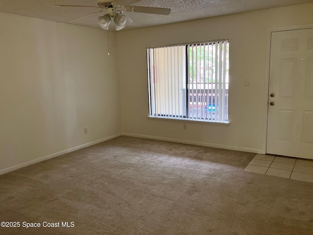 1515 Huntington Ln Unit 223, Rockledge, FL 32955 - carpeted spare room with ceiling fan and tile patterned flooring