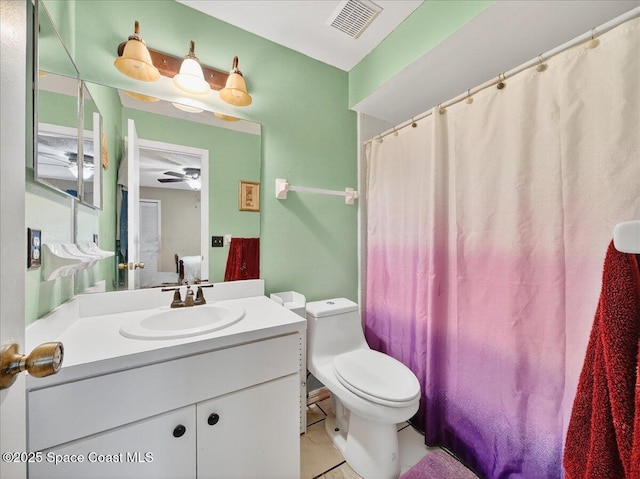 3116 Winchester Dr, Cocoa, FL 32926 - bathroom with vanity, tile patterned floors, ceiling fan, and curtained shower
