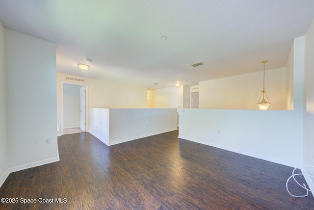 6065 Balboa St, Cocoa, FL 32927 - spare room featuring wood finished floors and baseboards