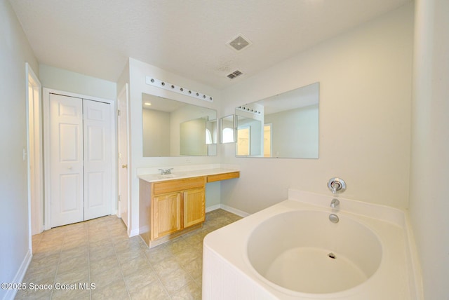 6065 Balboa St, Cocoa, FL 32927 - full bathroom with a garden tub and vanity