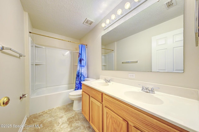 6065 Balboa St, Cocoa, FL 32927 - bathroom with double vanity, shower / bath combo, and a textured ceiling
