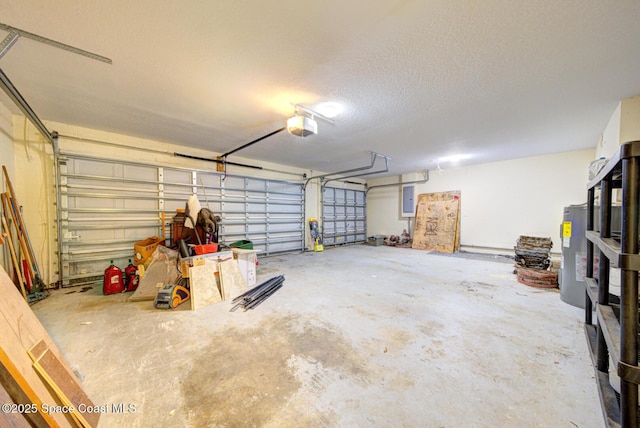 6065 Balboa St, Cocoa, FL 32927 - garage with electric panel, a garage door opener, and electric water heater
