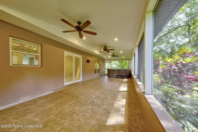 6065 Balboa St, Cocoa, FL 32927 - unfurnished sunroom with a hot tub