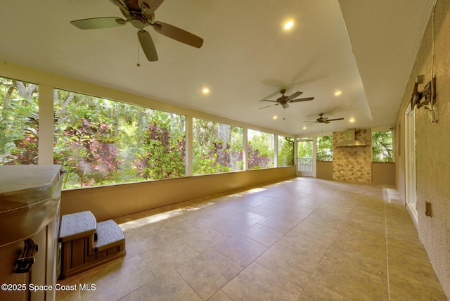 6065 Balboa St, Cocoa, FL 32927 - unfurnished sunroom featuring tile patterned flooring and recessed lighting