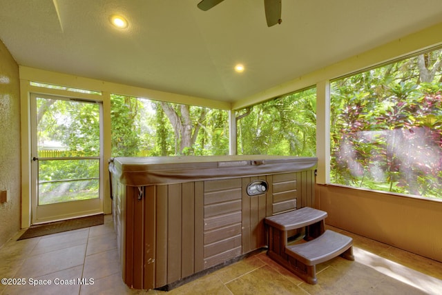 6065 Balboa St, Cocoa, FL 32927 - sunroom with a hot tub, tile patterned floors, and recessed lighting