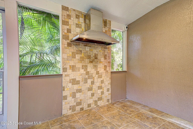 6065 Balboa St, Cocoa, FL 32927 - detailed view of wall chimney exhaust hood