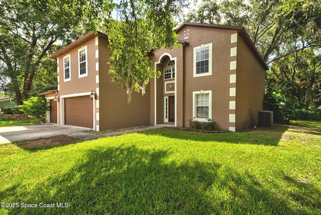 6065 Balboa St, Cocoa, FL 32927 - view of front facade with a garage, stucco siding, driveway, and a front yard