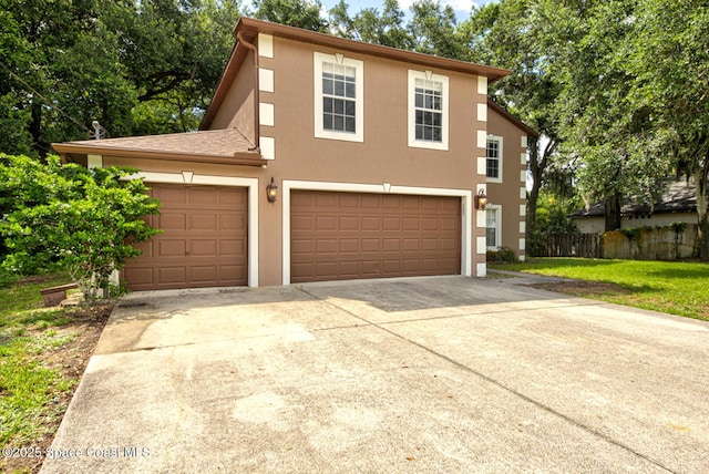 6065 Balboa St, Cocoa, FL 32927 - view of front of house with driveway, stucco siding, and an attached garage