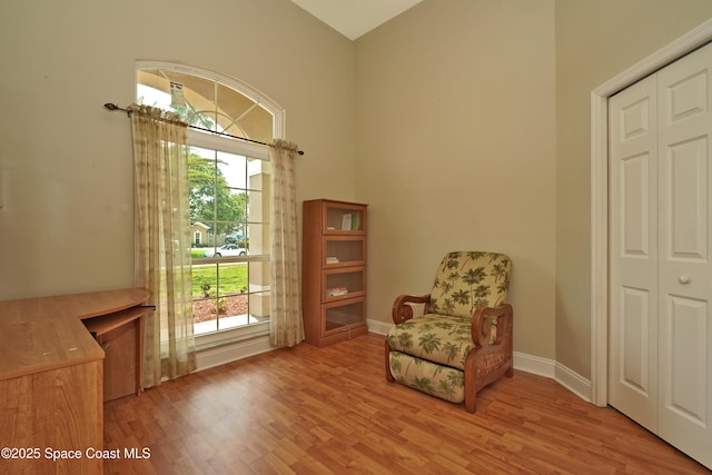 401 Stonehenge Cir, Rockledge, FL 32955 - living area with high vaulted ceiling and wood finished floors