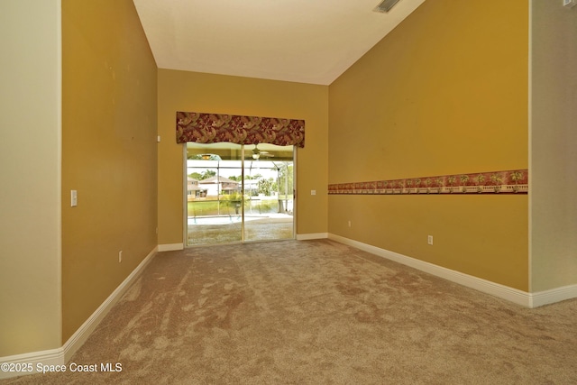 401 Stonehenge Cir, Rockledge, FL 32955 - empty room with carpet floors and lofted ceiling