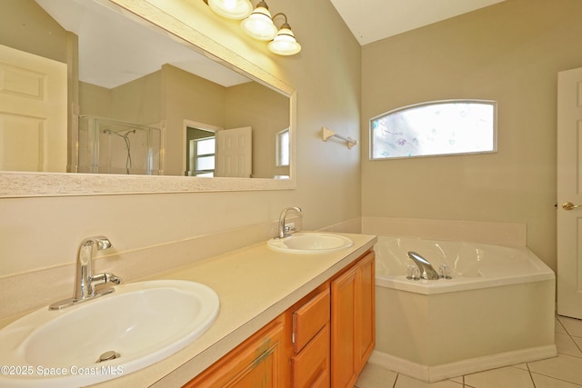 401 Stonehenge Cir, Rockledge, FL 32955 - full bath with a stall shower, tile patterned floors, double vanity, and a bath