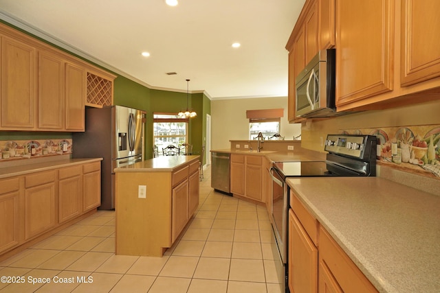 401 Stonehenge Cir, Rockledge, FL 32955 - kitchen with appliances with stainless steel finishes, a chandelier, light countertops, light tile patterned flooring, and recessed lighting