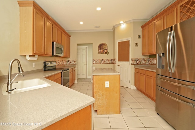 401 Stonehenge Cir, Rockledge, FL 32955 - kitchen featuring appliances with stainless steel finishes, light tile patterned flooring, crown molding, a kitchen island, and light countertops