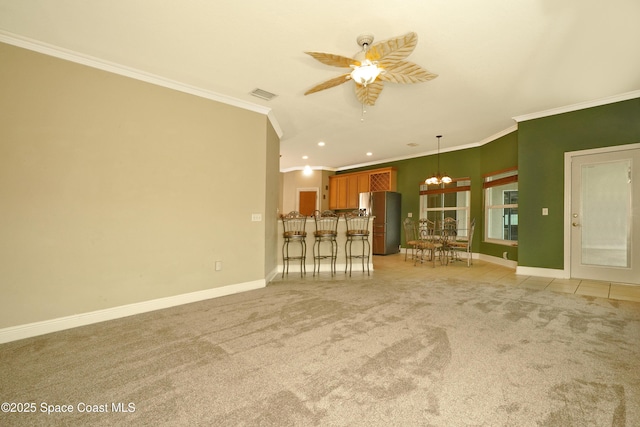 401 Stonehenge Cir, Rockledge, FL 32955 - unfurnished living room featuring a ceiling fan, ornamental molding, a chandelier, light colored carpet, and recessed lighting