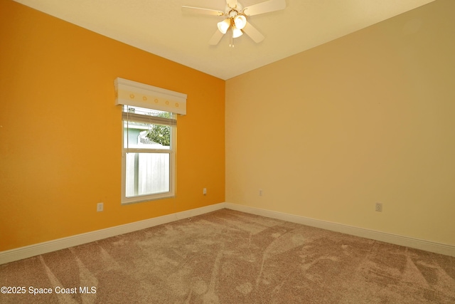 401 Stonehenge Cir, Rockledge, FL 32955 - spare room featuring carpet floors and ceiling fan