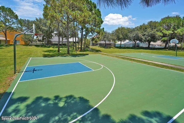 401 Stonehenge Cir, Rockledge, FL 32955 - view of basketball court with community basketball court and a yard
