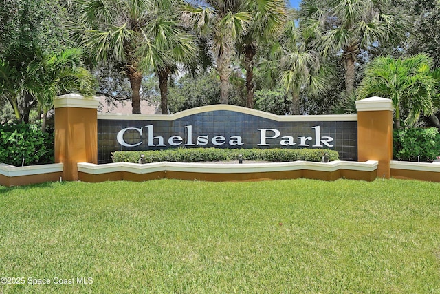 401 Stonehenge Cir, Rockledge, FL 32955 - community sign featuring a lawn