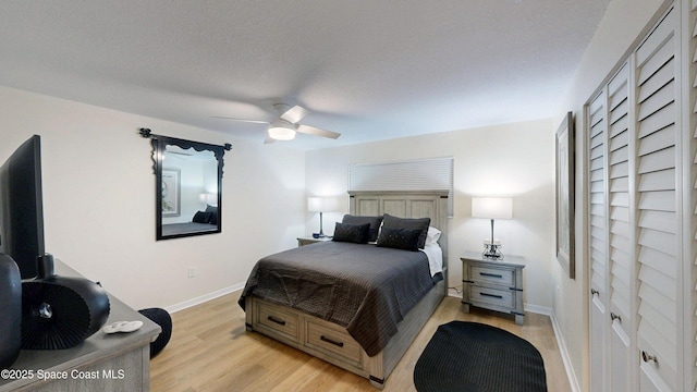 3799 S Banana River Blvd Unit 1025, Cocoa Beach, FL 32931 - bedroom featuring light wood-type flooring and ceiling fan