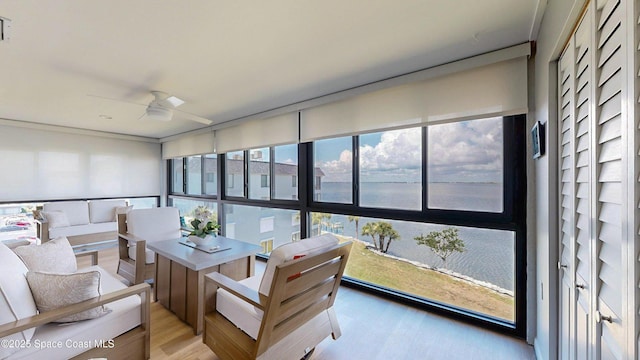 3799 S Banana River Blvd Unit 1025, Cocoa Beach, FL 32931 - sunroom / solarium with healthy amount of natural light and a water view