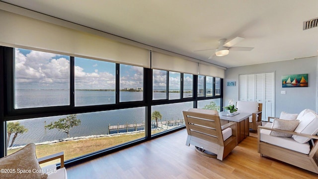 3799 S Banana River Blvd Unit 1025, Cocoa Beach, FL 32931 - sunroom / solarium featuring a water view