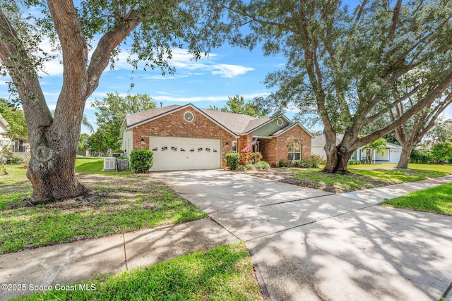 1218 Rolling Meadows Dr, Rockledge, FL 32955 - view of front of property with brick siding, an attached garage, driveway, and a front lawn