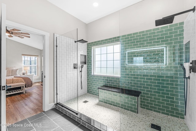 1218 Rolling Meadows Dr, Rockledge, FL 32955 - bathroom with walk in shower, connected bathroom, tile patterned floors, and vaulted ceiling