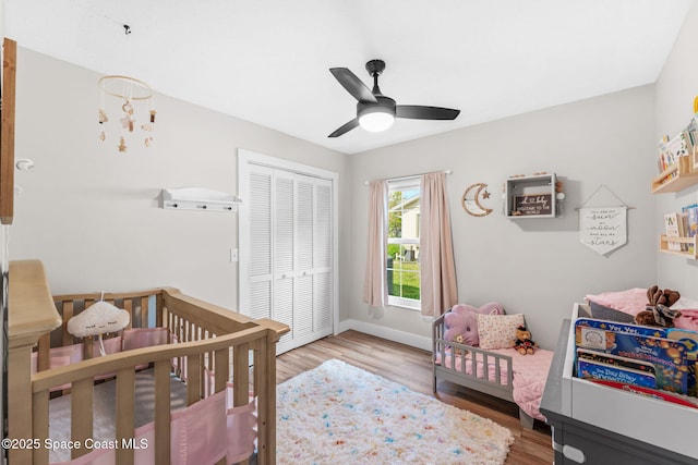 1218 Rolling Meadows Dr, Rockledge, FL 32955 - bedroom with a closet, light wood-style floors, and ceiling fan