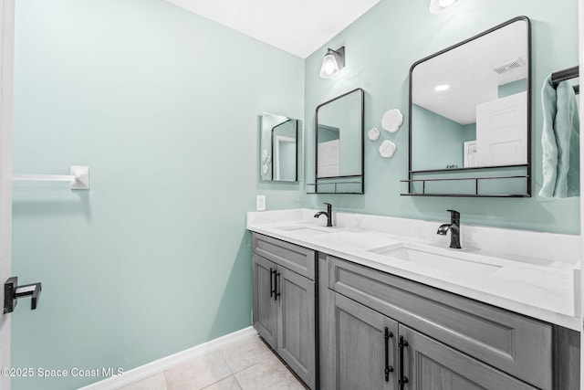 1218 Rolling Meadows Dr, Rockledge, FL 32955 - bathroom featuring double vanity and tile patterned floors