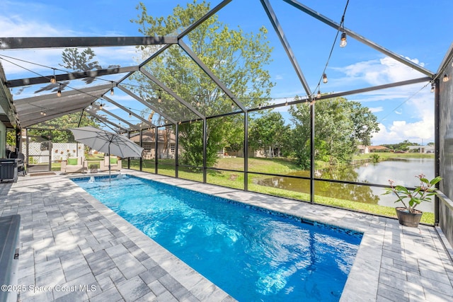 1218 Rolling Meadows Dr, Rockledge, FL 32955 - outdoor pool with a patio, a lanai, and a water view