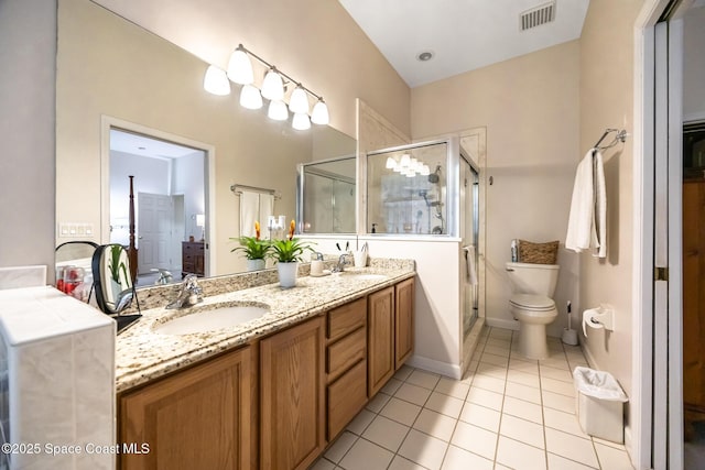 4595 Alan Shepard Ave, Cocoa, FL 32926 - bathroom with tile patterned flooring, a stall shower, and double vanity