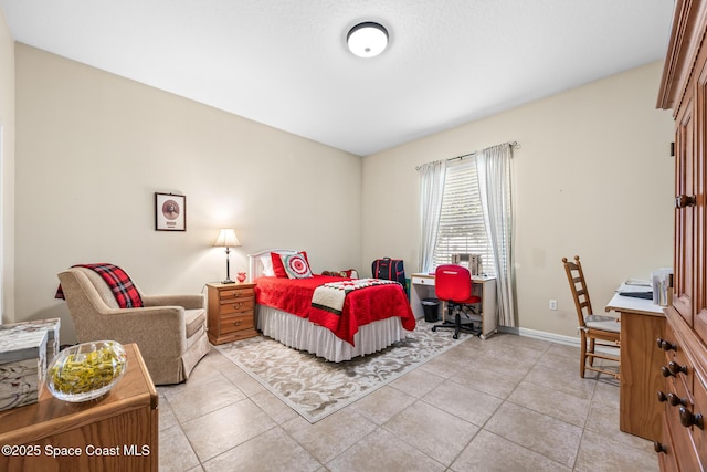 4595 Alan Shepard Ave, Cocoa, FL 32926 - bedroom with light tile patterned flooring