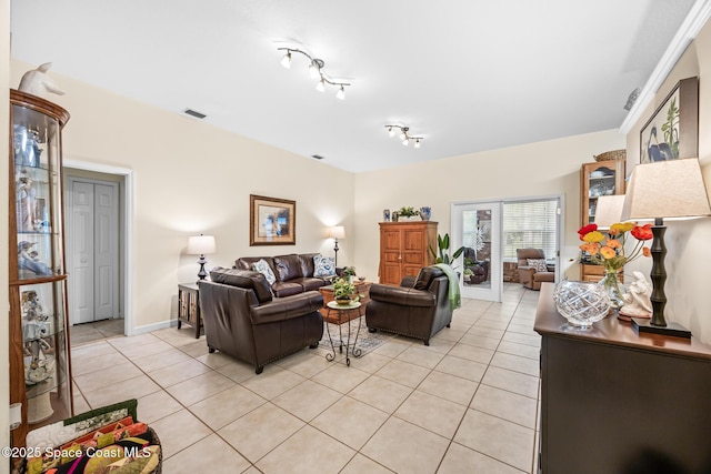 4595 Alan Shepard Ave, Cocoa, FL 32926 - living area with light tile patterned floors