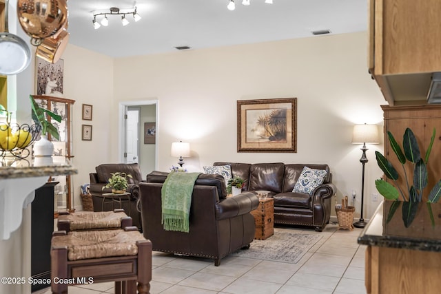 4595 Alan Shepard Ave, Cocoa, FL 32926 - living area featuring light tile patterned flooring