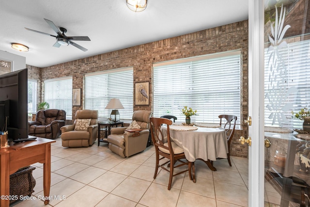 4595 Alan Shepard Ave, Cocoa, FL 32926 - dining area with light tile patterned floors and a ceiling fan