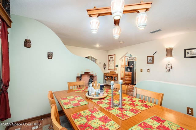 3717 SW Bayfield St, Cocoa, FL 32926 - dining area with wood finished floors