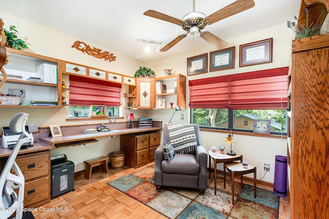 3717 SW Bayfield St, Cocoa, FL 32926 - office area featuring plenty of natural light, ceiling fan, and built in study area