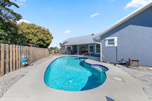 100 Matthews St, Satellite Beach, FL 32937 - view of pool featuring a patio and a fenced backyard