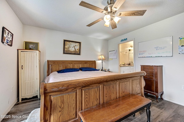 1689 Colorado St SE, Palm Bay, FL 32909 - bedroom featuring dark wood finished floors, ensuite bathroom, and ceiling fan