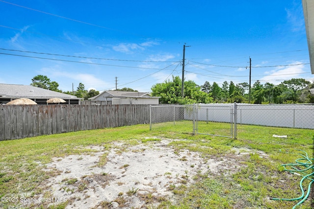 1689 Colorado St SE, Palm Bay, FL 32909 - view of yard with a gate